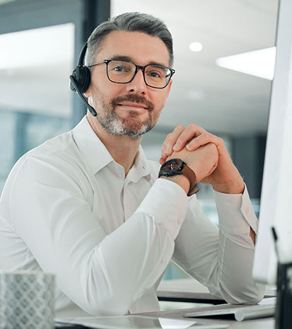 Insurance Agent Smiling Helping Medicare Advantage Customers